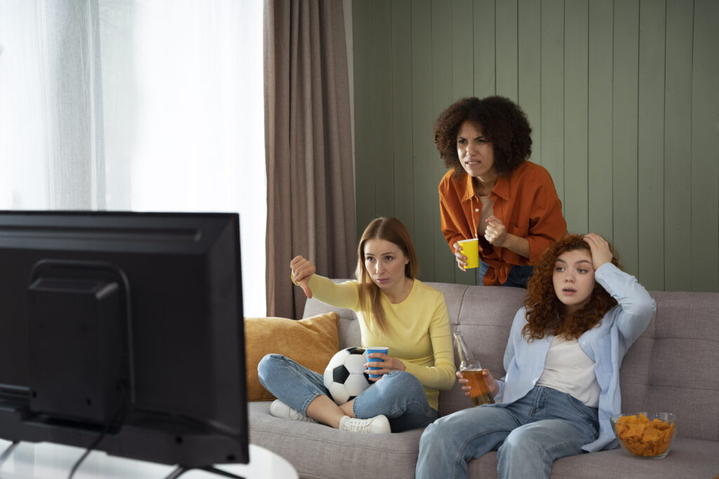 Friends watching sports on MaxTelly